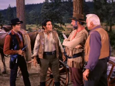 Candy brings Matar (Rodolfo Acosta) to the Ponderosa to prove Beaudry (John Vernon) knows him. .jpg