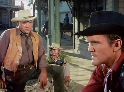 Ben believes Candy when he says he did not cheat at the saloon poker game. season 10.jpg